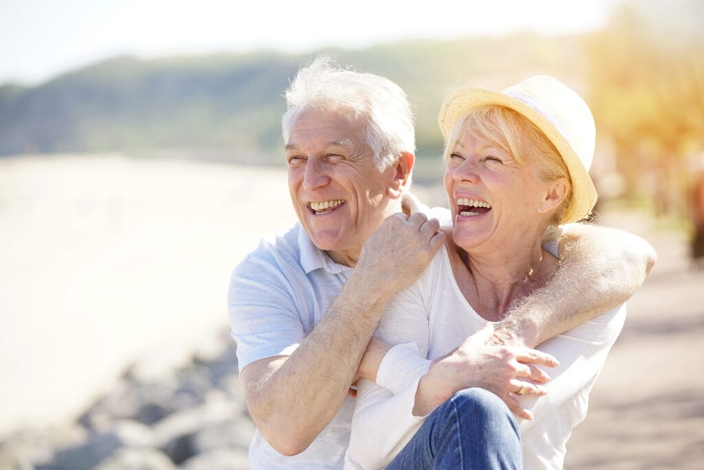 Older couple laughing after dry eye treatment